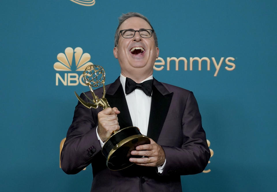 John Oliver poses in the press room with the award for outstanding variety talk series at the 74th Primetime Emmy Awards on Monday, Sept. 12, 2022, at the Microsoft Theater in Los Angeles. (AP Photo/Jae C. Hong)