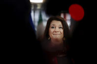 Sweden's Foreign Minister Ann Linde speaks with the media as she arrives for a meeting of EU foreign ministers at the European Council building in Brussels, Monday, May 10, 2021. EU Foreign Affairs Ministers meet in Brussels to discuss current affairs, tensions with Russia, the Western Balkans, transatlantic relations and Belarus. (AP Photo/Olivier Matthys, Pool)