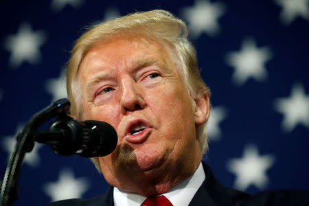 FILE PHOTO - U.S. President Donald Trump speaks about tax reform during a visit to Loren Cook Company in Springfield, Missouri, U.S., August 30, 2017. REUTERS/Kevin Lamarque