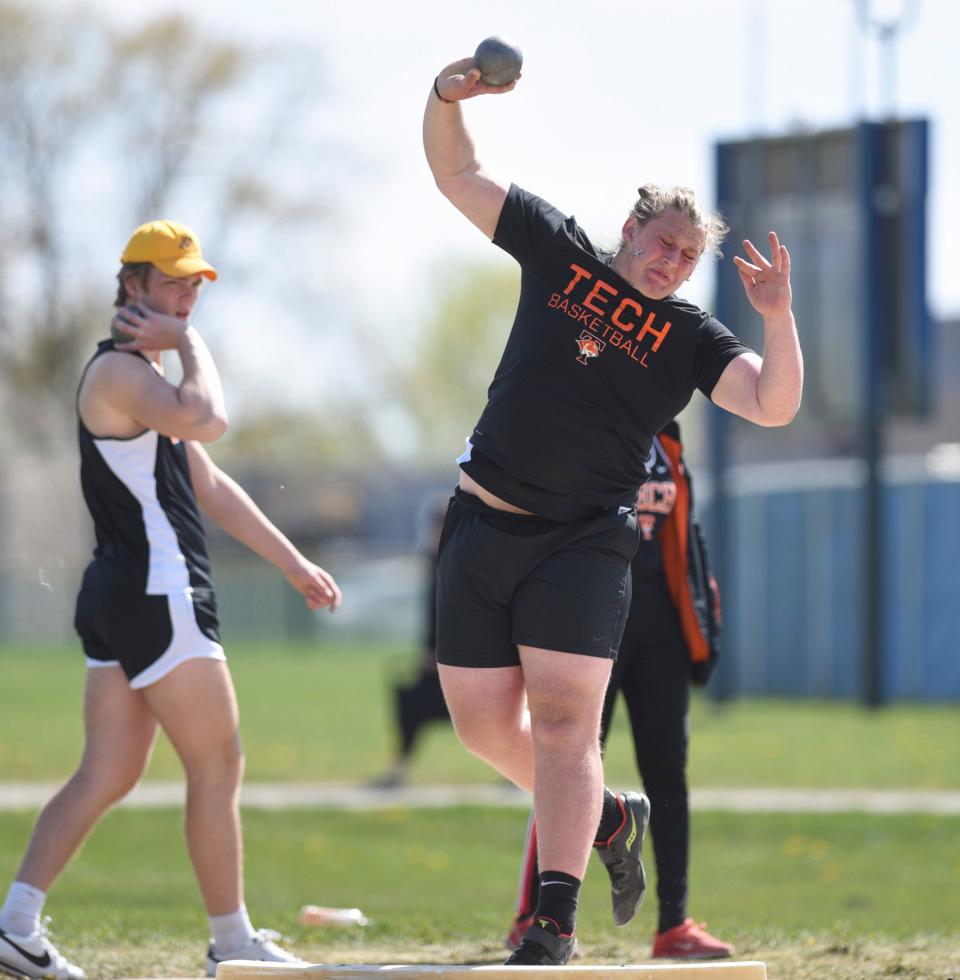 Tech junior John Kaczor throws the shot put Thursday, May 13, 2021, at Apollo High School.