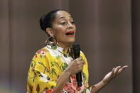 Tracee Ellis Ross introduces former first lady Michelle Obama at the "Becoming: An Intimate Conversation with Michelle Obama" event at the Forum on Thursday, Nov. 15, 2018, in Inglewood, Calif. (Photo by Willy Sanjuan/Invision/AP)