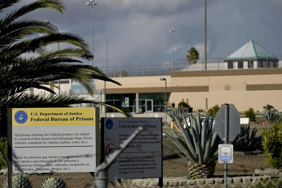 The Federal Correctional Institution is shown in Dublin, Calif., Monday, Dec. 5, 2022. Thomas Ray Hinkle, a senior official at the federal Bureau of Prisons has been repeatedly promoted, most recently to one of the highest posts in the agency. And this has happened despite his being accused of beating multiple Black inmates in the 1990s. An Associated Press investigation has found the Bureau of Prisons has continued to promote Hinkle despite numerous red flags. (AP Photo/Jeff Chiu)