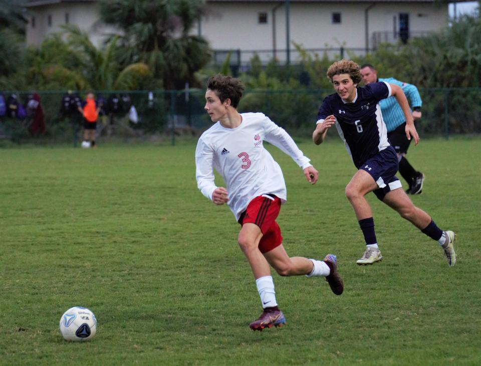 Vero Beach's Hayden Gibbons brings the ball up the field during a high school soccer match against St. Edward's in the Indian River Cup on Friday, Dec. 16, 2022 in Vero Beach. Gibbons scored the go-ahead goal in the 97th minute to give Vero a 2-1 win in extra time.