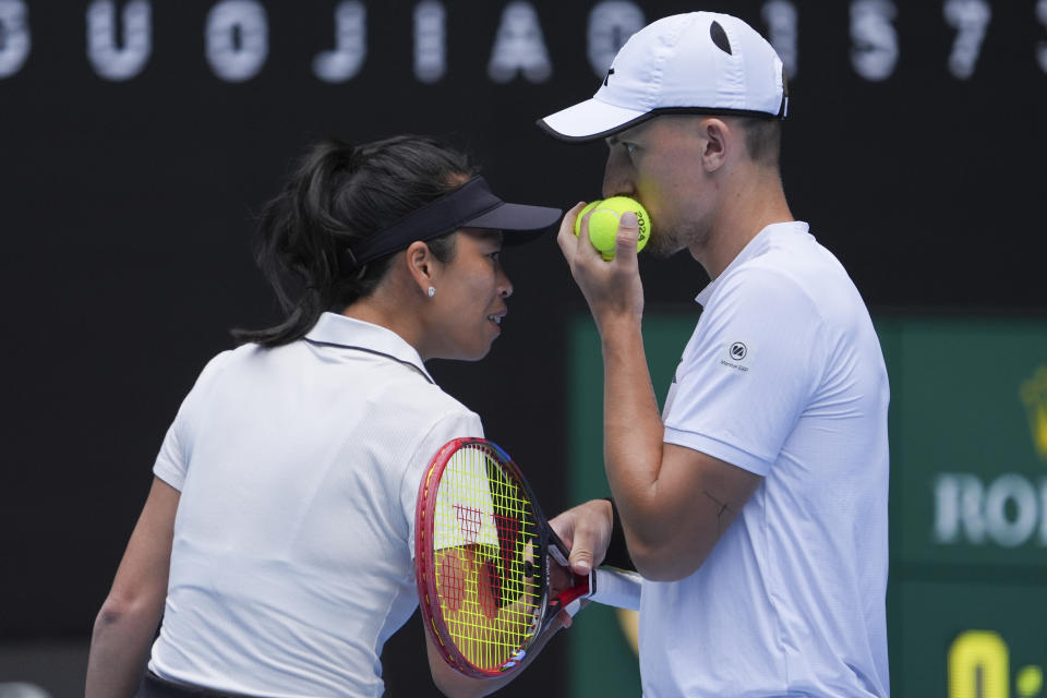 Hsieh Su-Wei, left, of Taiwan and Jan Zielinski of Poland in action against Desirae Krawczyk of the U.S. and Neal Skupski of Britain during the mixed doubles final match at the Australian Open tennis championships at Melbourne Park, Melbourne, Australia, Friday, Jan. 26, 2024. (AP Photo/Andy Wong)