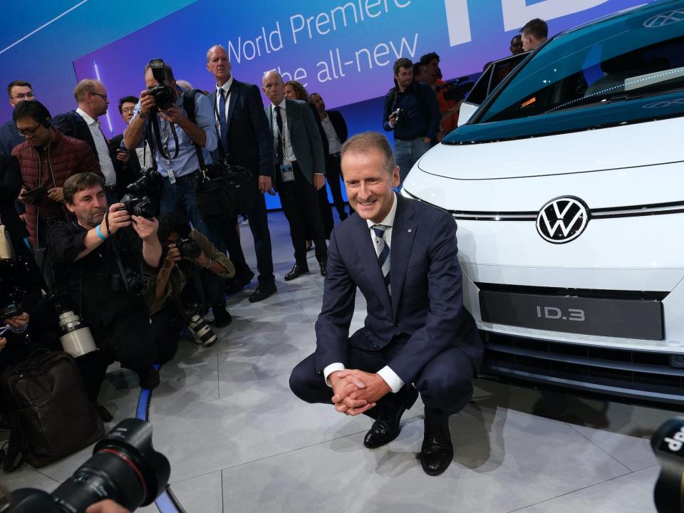 Herbert Diess, Chairman of Volkswagen Group, poses with the new Volkswagen ID.3 electric car at the Volkswagen media preview at the 2019 IAA Frankfurt Auto Show on September 09, 2019 in Frankfurt am Main, Germany.