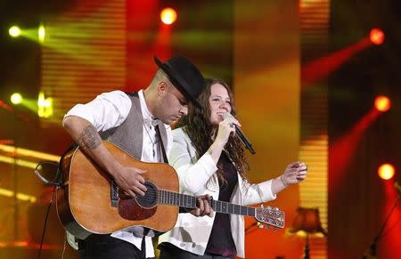 Mexican pop duo Jesse & Joy perform during the 55th International Song Festival in Vina del Mar city, about 121km (75 miles) northwest of Santiago, February 28, 2014. REUTERS/Eliseo Fernandez