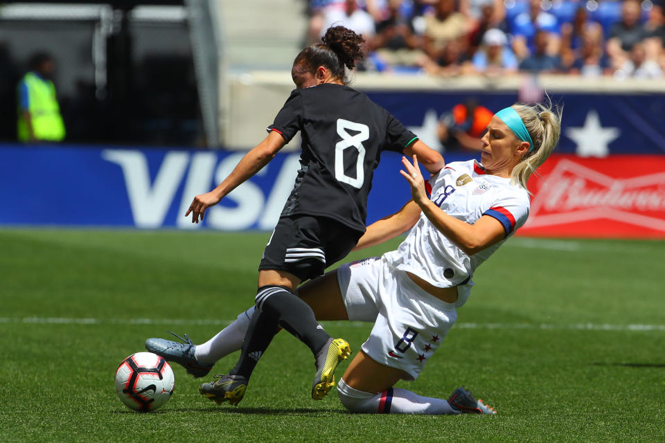 HARRISON, NJ - MAY 26:  United States of America forward Julie Ertz (8) tackles Mexico midfielder Joana Robles (8) during the first half of the Womens soccer game between the United States of America versus Mexico Womens Soccer game at Red Bull Arena on May 26, 2019 in Harrison, NJ.  (Photo by Rich Graessle/Icon Sportswire via Getty Images)