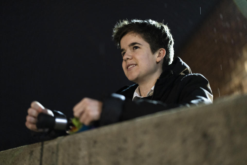 Central Bucks School District high school student Leo Burchell waits outside for a school board meeting to start in Doylestown, Pa., on Tuesday, Nov. 15, 2022. “So, I changed my name to Leo, and for a while it was tough,” he said. “I told some of my friends. I told the people close to me, but I wasn’t ready to come out to everybody yet ... and I had the space to do that in my own time.” (AP Photo/Ryan Collerd)