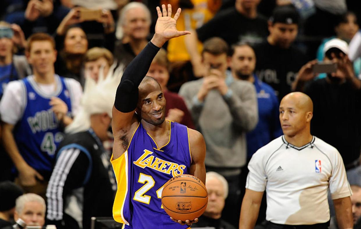 <span class="caption">Kobe Bryant #24 of the Los Angeles Lakers waves to the crowd after passing Michael Jordan on the all-time scoring list in 2014</span> <span class="attribution"><a class="link " href="https://www.gettyimages.com/detail/news-photo/kobe-bryant-of-the-los-angeles-lakers-waves-to-the-crowd-news-photo/460472466?adppopup=true" rel="nofollow noopener" target="_blank" data-ylk="slk:Hannah Foslein/Getty Images;elm:context_link;itc:0;sec:content-canvas">Hannah Foslein/Getty Images</a></span>