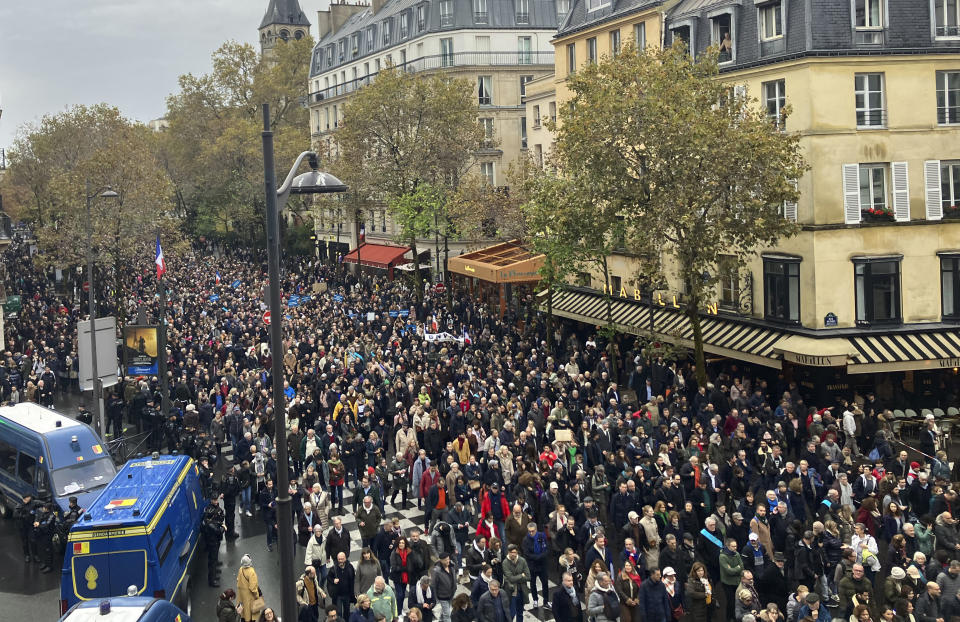 Thousands gather for a march against antisemitism in Paris, France, Sunday, Nov. 12, 2023. French authorities have registered more than 1,000 acts against Jews around the country in a month since the conflict in the Middle East began. (AP Photo/Sylvie Corbet)