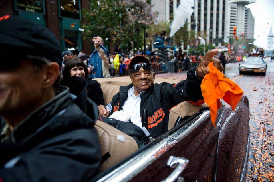 San Francisco Giants legend Willie Mays celebrates with the 2014 World Series Championship team during a victory parade in San Francisco.