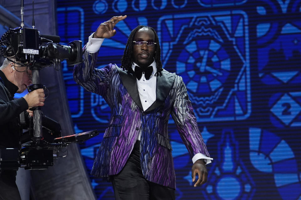 Missouri defensive lineman Darius Robinson walks on stage during the first round of the NFL football draft, Thursday, April 25, 2024, in Detroit. (AP Photo/Jeff Roberson)