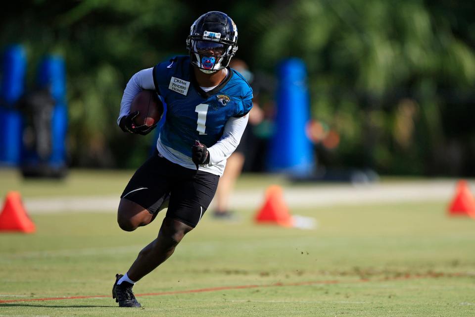 Jacksonville Jaguars running back Travis Etienne Jr. (1) runs during day 2 of the Jaguars Training Camp Tuesday, July 26, 2022 at the Knight Sports Complex at Episcopal School of Jacksonville. 