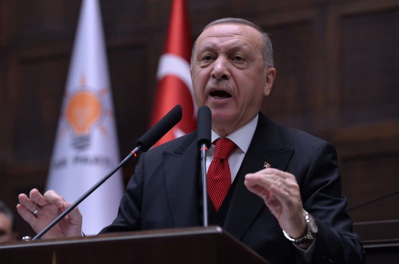 Turkish President Erdogan addresses members of his ruling AK Party at the parliament in Ankara