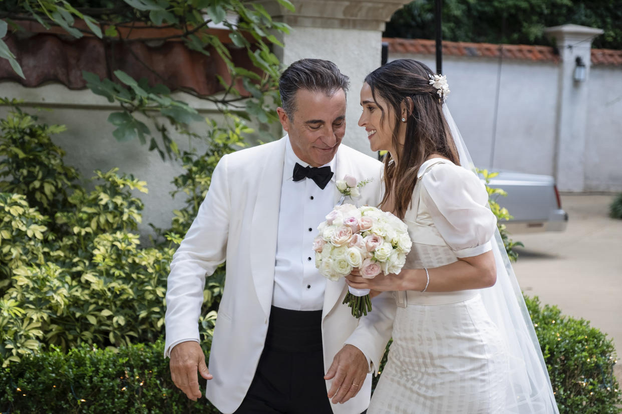 It does appear Arjona's character Sophie is eventually able to walk down the aisle with her dad, Billy (played by Andy García) in the film.  (Claudette Barius)