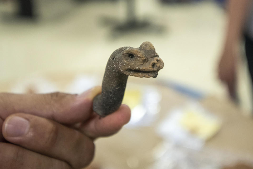 Picture of pieces found at Tayasal archaeological site, in the municipality of Flores, Peten Department, 500 km north of Guatemala City, on October 28, 2022.  / Credit: CARLOS ALONZO/AFP via Getty Images