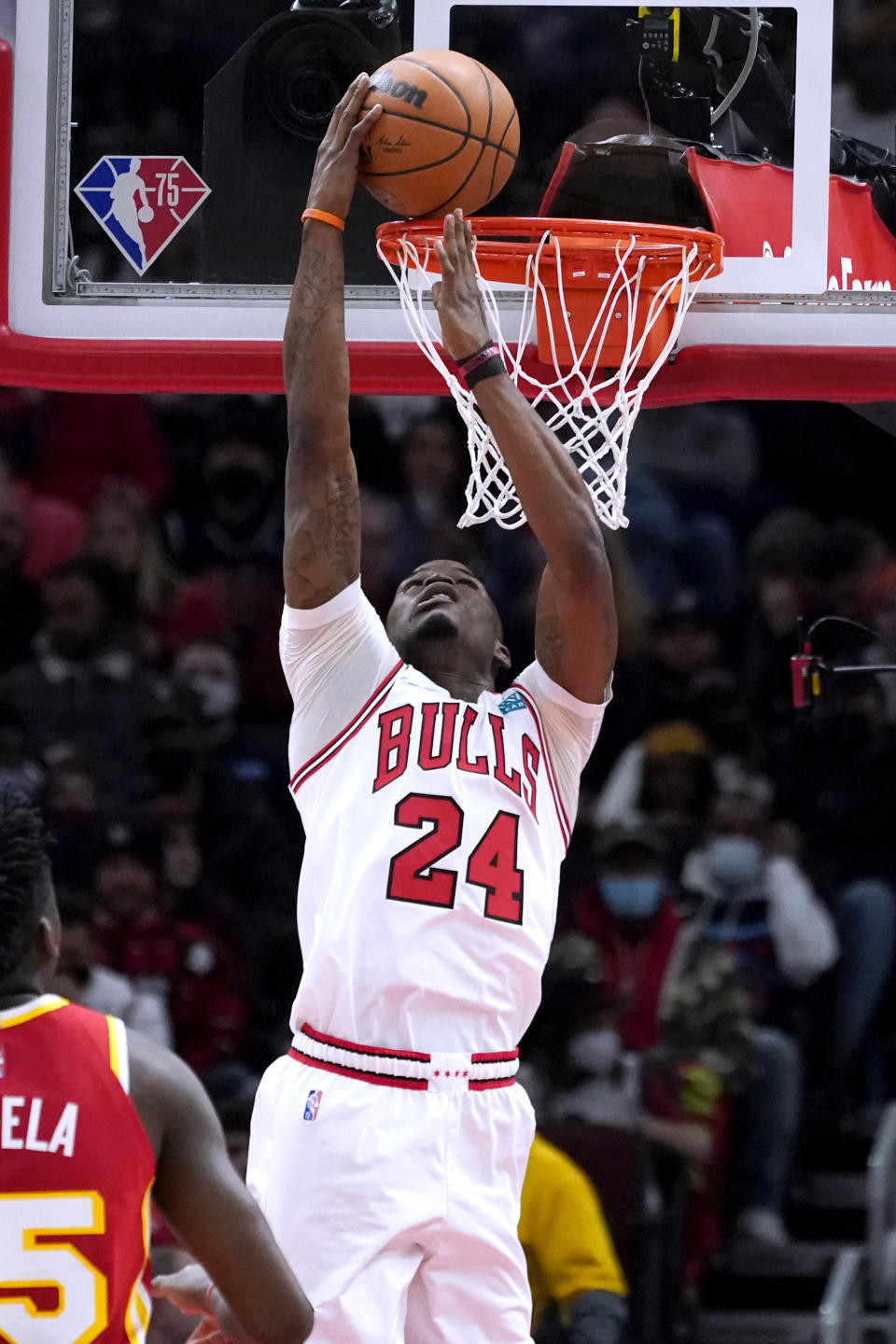 Chicago Bulls forward Javonte Green (24) dunks against the Atlanta Hawks during the first half of an NBA basketball game in Chicago, Wednesday, Dec. 29, 2021. (AP Photo/Nam Y. Huh)