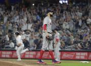 Boston Red Sox starting pitcher David Price walks on the mound as New York Yankees' Luke Voit runs the bases after hitting a two-run home run during the sixth inning of a baseball game Wednesday, Sept. 19, 2018, in New York. (AP Photo/Frank Franklin II)