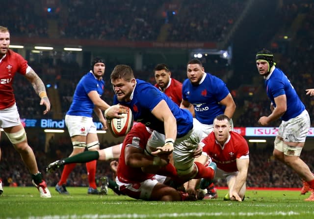 France’s Paul Willemse, centre, scores against Wales