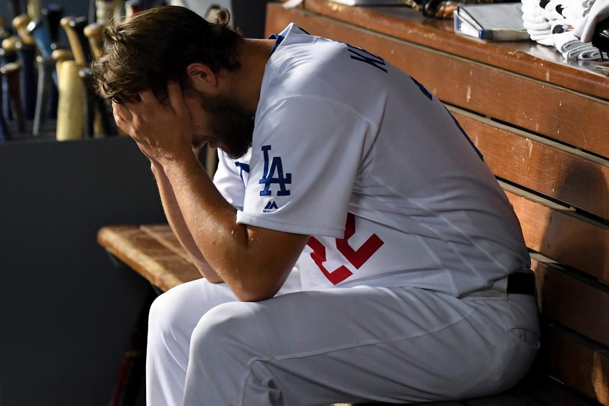 Clayton Kershaw in the dugout during Game 5 of the 2019 NLDS against the Nationals.