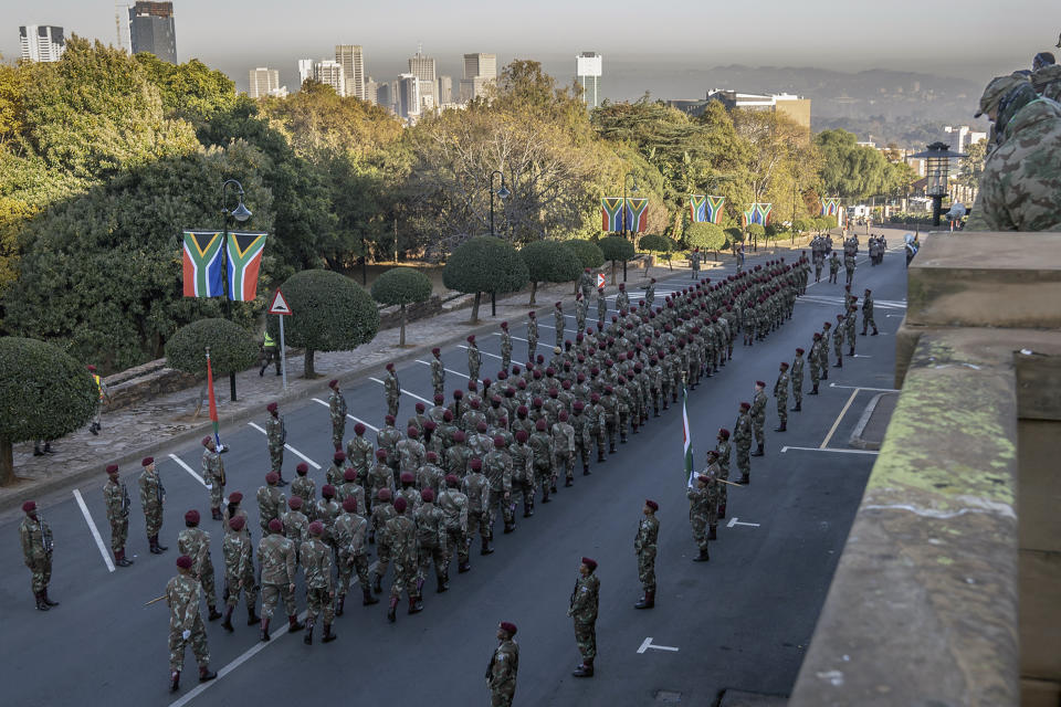 Members of the South African Defence Force await the the arrival of President-elect Cyril Ramaphosa ahead of the inauguration ceremony at the Union Buildings in Tshwane, South Africa, Wednesday, June 19, 2024. (AP Photo/Shiraaz Mohamed)