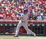 May 20, 2018; Cincinnati, OH, USA; Chicago Cubs left fielder Kyle Schwarber hits a two-run home run against the Cincinnati Reds during the second inning at Great American Ball Park. Mandatory Credit: David Kohl-USA TODAY Sports