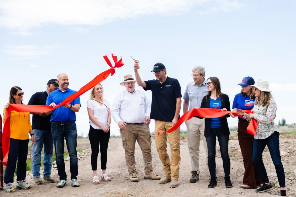 Dave Livermore, Utah director for The Nature Conservancy, and Chris Brown, the group’s director of stewardship, join others in a ribbon-cutting after the completion of the Freeport Drain project at the Great Salt Lake Shorelands Preserve in Layton on Wednesday, May 17, 2023. | Ryan Sun, Deseret News