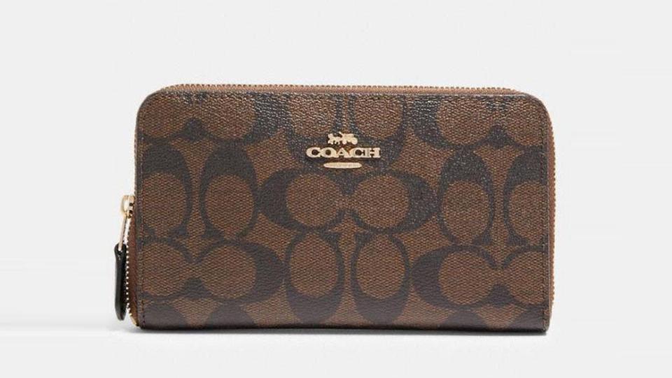 Signature Coach wallets are on sale during the Coach Outlet Prime Day sale.