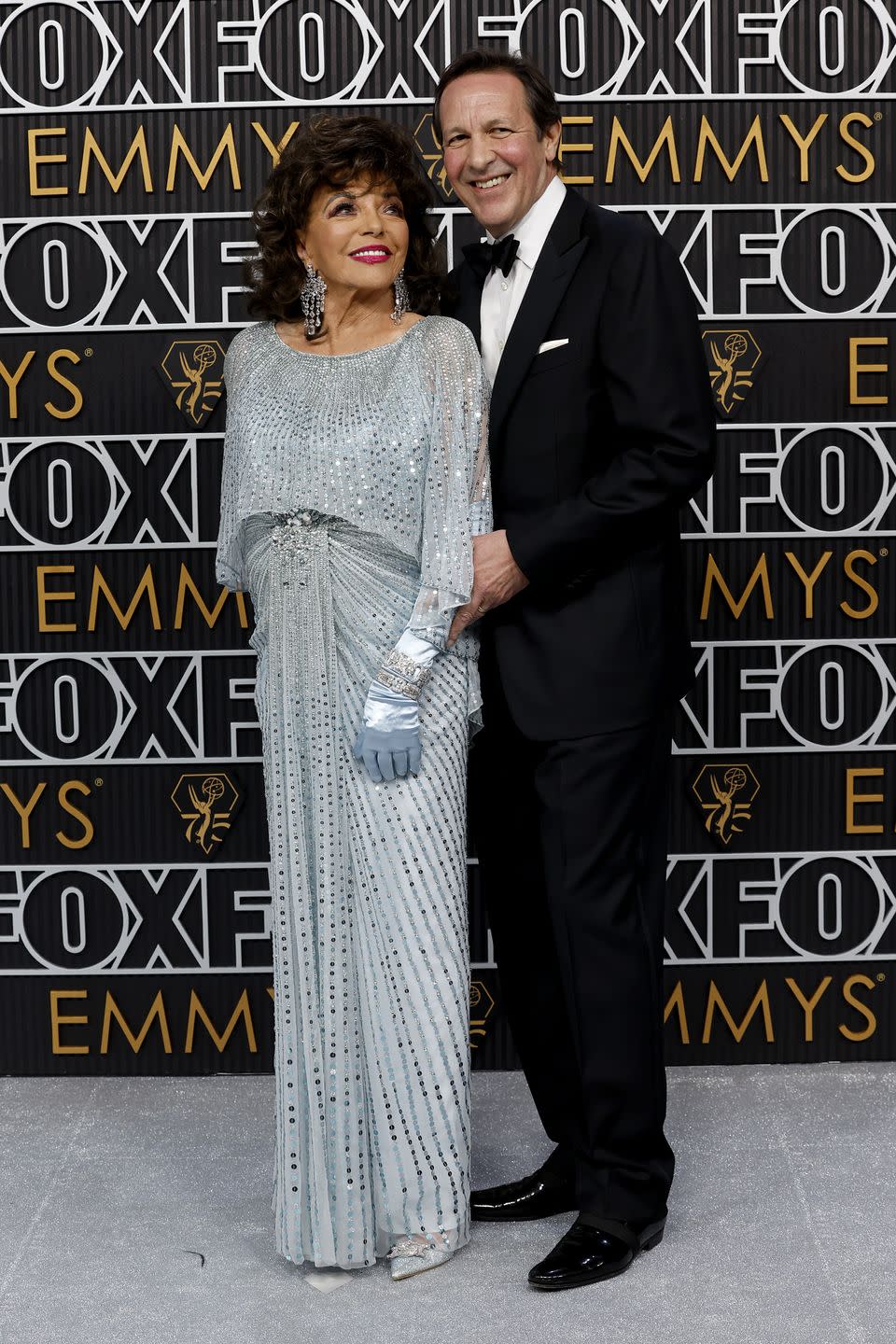 los angeles, california january 15 l r dame joan collins and percy gibson attend the 75th primetime emmy awards at peacock theater on january 15, 2024 in los angeles, california photo by frazer harrisongetty images