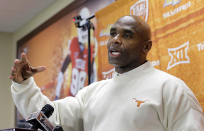 Texas head football coach Charlie Strong talks to the media about his 2015 recruiting class on national signing day, Wednesday, Feb. 4, 2015, in Austin, Texas. (AP Photo/Eric Gay)