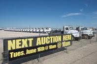 Equipment stored at the Machinery Auctioneers lot for an upcoming auction are shown in Odessa, Texas June 4, 2015. REUTERS/Cooper Neill