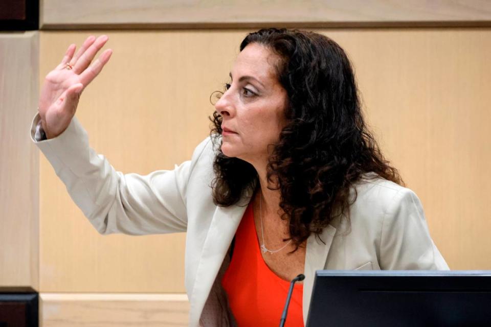 Assistant State Attorney Michelle Boutros sworn in to testify as a witness during a hearing in the trial of Jamell Demons, better known as rapper YNW Melly, at the Broward County Courthouse in Fort Lauderdale on Friday, Oct. 6, 2023. Defense lawyers say she overheard Miramar Police Detective Mark Moretti, the lead investigator on Demons’ case, express a willingness to lie about his seizure of a phone belonging to Demons’ mother, Jamie King, during a Fort Lauderdale courthouse interview last October. (Amy Beth Bennett / South Florida Sun Sentinel)