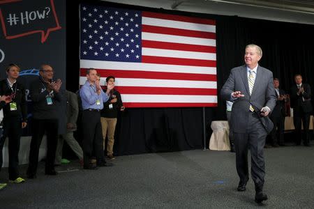 U.S. Republican presidential candidate and U.S. Senator Lindsey Graham takes the stage to speak at the No Labels Problem Solver Convention in Manchester, New Hampshire October 12, 2015. REUTERS/Brian Snyder