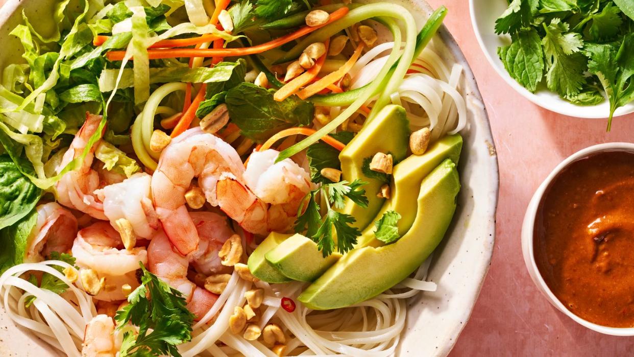 summer roll bowl with rice noodles, shrimp, avocado, and peanuts