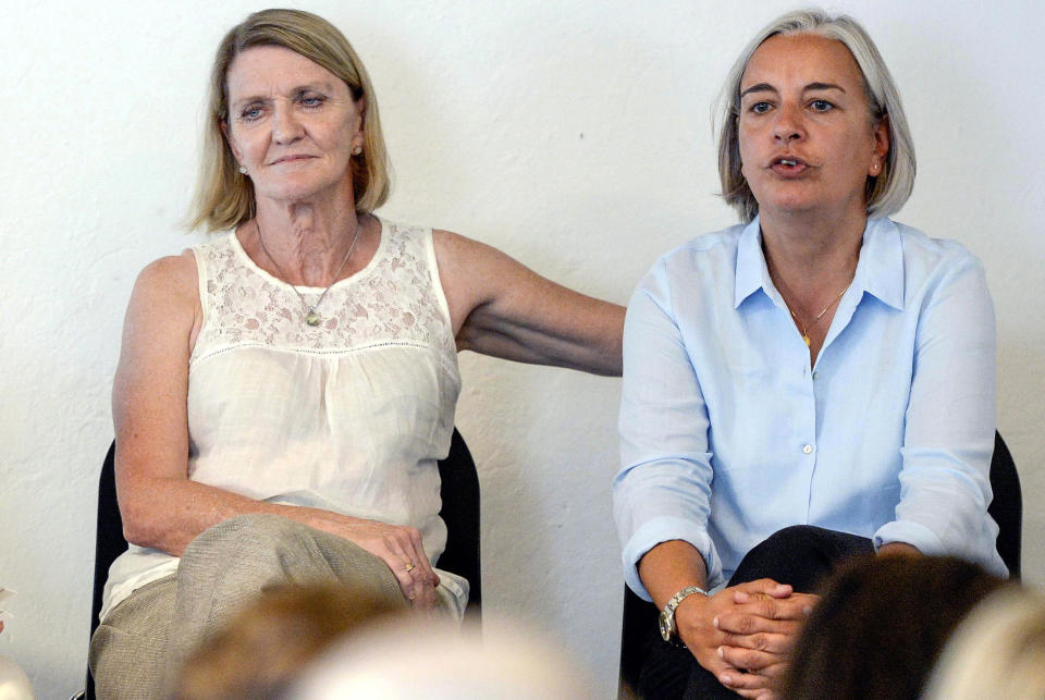 FILE - In this Aug. 27, 2013 file photo Associated Press photographer Anja Niedringhaus, right, and AP journalist Kathy Gannon, are pictured during a visit to the photo agency Keystone in Zurich, Switzerland . Niedringhaus, 48, was killed and Kathy Gannon was wounded Friday, April 4, 2014 when an Afghan policeman opened fire while they were sitting in their car in eastern Afghanistan. Niedringhaus, an internationally acclaimed German photographer, was killed instantly, according to an AP freelancer who witnessed the shooting. Gannon, the reporter, was wounded twice and is receiving medical attention. (AP Photo/Keystone, Walter Bieri, File)