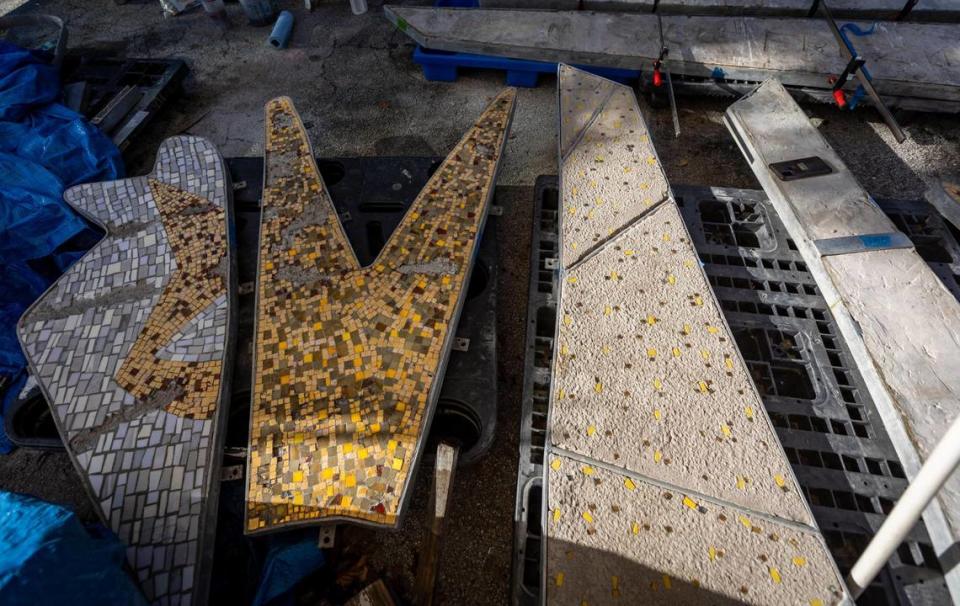 Sections of a monumental 1950s mosaic mural that was rescued from destruction in 2015 by Miami Beach preservationists sit under a tarp at Wynwood’s Bakehouse Art Complex, where the artwork is undergoing restoration. The mural by artist Jack Stewart depicts the Greek god Apollo and his mother and sister. It will be reinstalled at a new South Beach fire station. Jose A. Iglesias/jiglesias@elnuevoherald.com