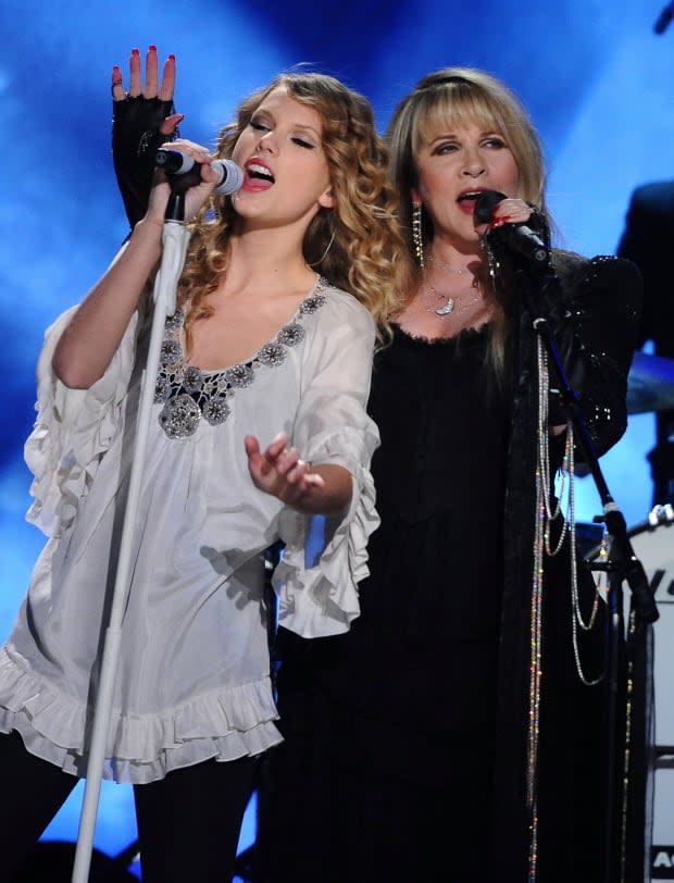 <p> Taylor Swift performs with <strong><a href="https://parade.com/tag/stevie-nicks" rel="nofollow noopener" target="_blank" data-ylk="slk:Stevie Nicks;elm:context_link;itc:0;sec:content-canvas" class="link ">Stevie Nicks</a></strong> at the Grammys on Jan. 31, 2010. A critic who panned Swift's vocals during the show inspired her song "Mean."</p><p>Michael Caulfield/WireImage</p>