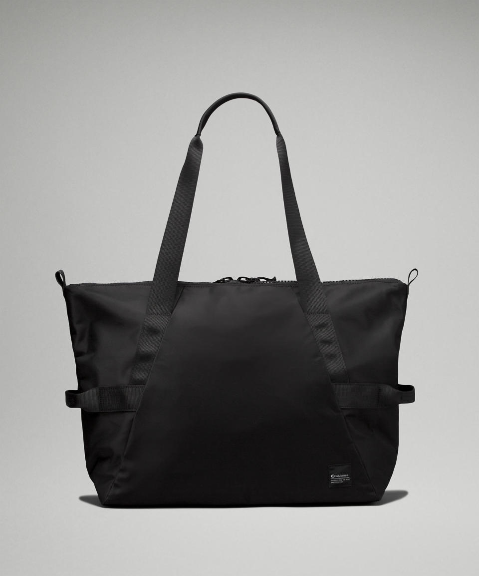 <p><a href="https://go.redirectingat.com?id=74968X1596630&url=https%3A%2F%2Fshop.lululemon.com%2Fp%2Fbags%2FAll-Day-Essentials-Tote-Bag-26L%2F_%2Fprod11510019&sref=https%3A%2F%2Fwww.womansday.com%2Fstyle%2Fg44915496%2Fbest-laptop-bags-for-women%2F" rel="nofollow noopener" target="_blank" data-ylk="slk:Shop Now;elm:context_link;itc:0;sec:content-canvas" class="link ">Shop Now</a></p><p>All Day Essentials Tote Bag 26L</p><p>lululemon.com</p><p>$98.00</p><span class="copyright">Lululemon</span>