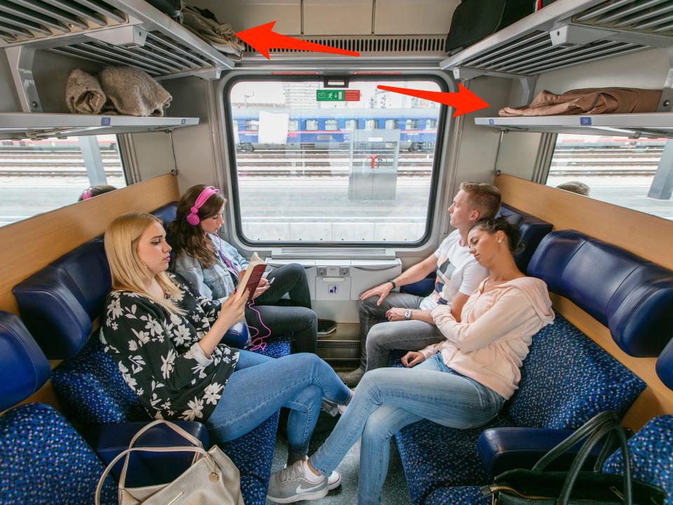Arrows point to luggage space in a seating carriage.