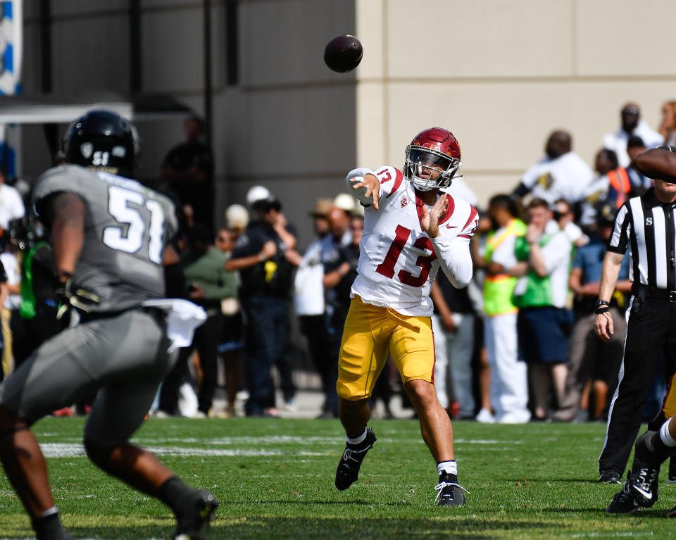 Sep 30, 2023; Boulder, Colorado, USA; USC Trojans quarterback Caleb Williams (13) drops back to make a pass down field during the third quarter against the Colorado Buffaloes at Folsom Field. Mandatory Credit: John Leyba-USA TODAY Sports