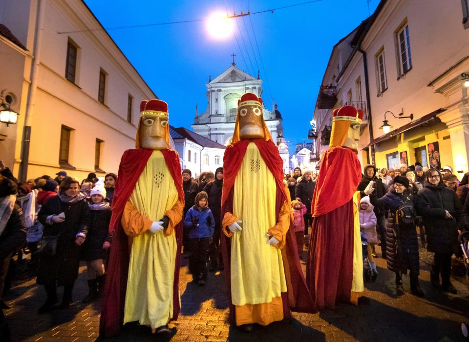 Lithuanians dressed as the Three Kings parade during the Epiphany Day celebrations in Vilnius, Lithuania, Monday, Jan. 6, 2020. Epiphany, the 12th night of Christmas, marks the day the three wise men visited Christ.
