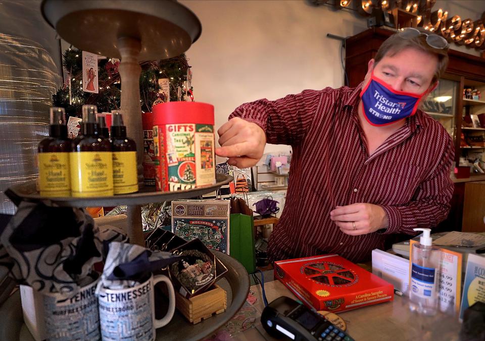 Chris Gerbman points out some of the items for sale at The Country Gourmet on Monday, Nov. 16, 2020, in Murfreesboro. 