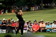 Dustin Johnson of the US play a shot during the first round of the 2016 PGA Championship at Baltusrol Golf Club on July 28, 2016