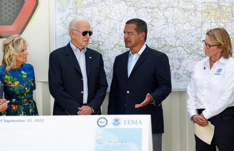Governor of Puerto Rico Pedro Pierluisi gives a briefing on Hurricane Fiona to U.S. President Joe Biden and First Lady Jill Biden, at Port of Ponce, Puerto Rico, October 3, 2022. REUTERS/Evelyn Hockstein