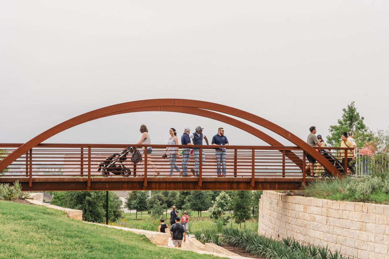 Skyline Park, in the Easton Park subdivision in Southeast Austin, features a bridge connection resembling Austin's iconic Pennybacker Bridge   over Lake Austin.