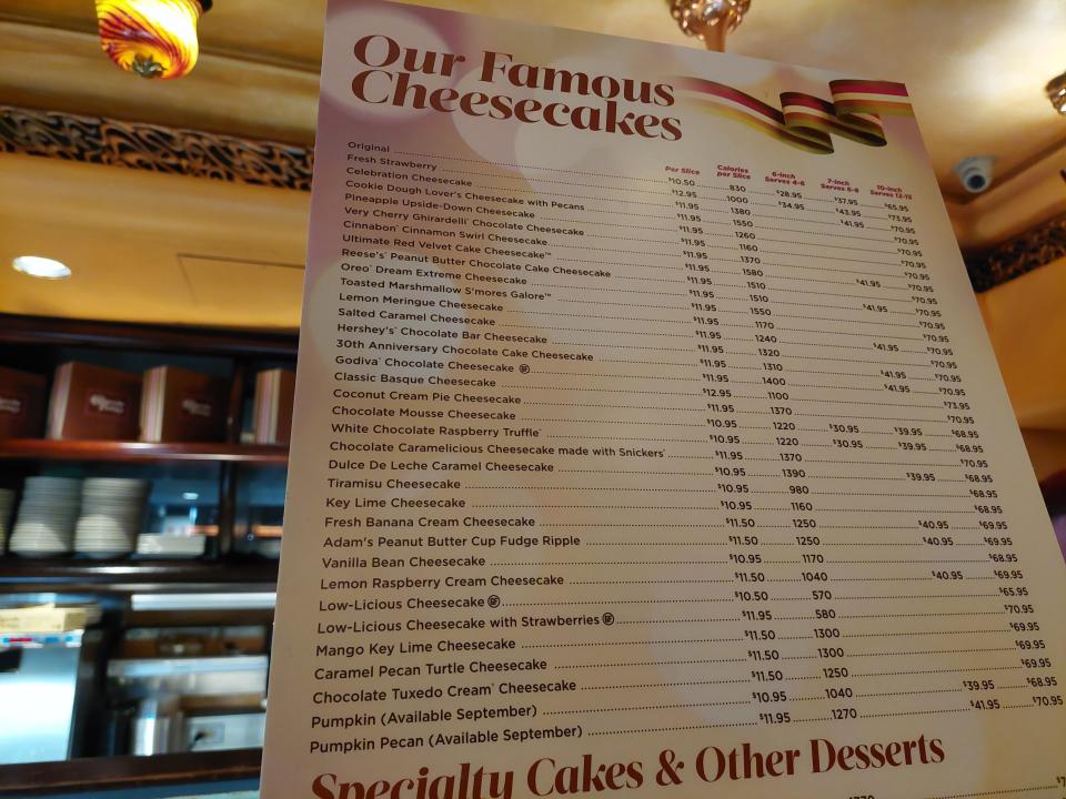 A photo of the cheesecake menu, with prices, at the Cheesecake Factory