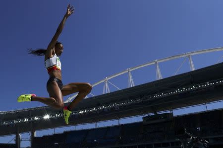 2016 Rio Olympics - Athletics - Women's Heptathlon Long Jump - Groups - Olympic Stadium - Rio de Janeiro, Brazil - 13/08/2016. Nafissatou Thiam (BEL) of Belgium competes. REUTERS/Phil Noble