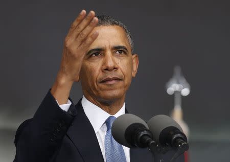 U.S. President Barack Obama arrives for the commencement ceremony at the United States Military Academy at West Point, New York, May 28, 2014. REUTERS/Kevin Lamarque