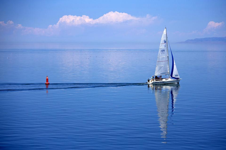 Sailors enjoy a Sunday afternoon on The Great Salt Lake. Salt Lake City is known for it poor air quality. Automotive and other emissions are trapped in the bowl shaped mountains.