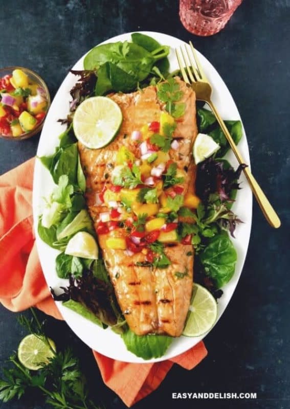 <p>Marinated Chili Lime Salmon, grilled to perfection and served with a tropical Caribbean Salsa. A healthy dish that will bring the tropics to your mouth!<strong> Get the Recipe: <a href="https://www.easyanddelish.com/easy-grilled-salmon/" rel="nofollow noopener" target="_blank" data-ylk="slk:Easy Grilled Salmon;elm:context_link;itc:0;sec:content-canvas" class="link ">Easy Grilled Salmon</a></strong></p>